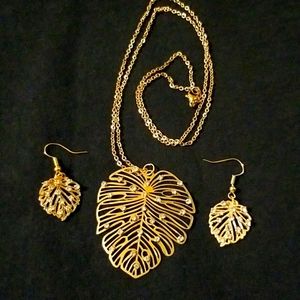 Earrings and Pendant necklace, rhinestones, gold tone.
